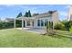 The home features a large, well-kept lawn and a covered patio in the backyard, perfect for outdoor enjoyment at 102 Harbor Point Ct, Summerville, SC 29486