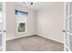 Bedroom with plush gray carpeting, white walls, and a window with blinds at 102 Harbor Point Ct, Summerville, SC 29486