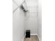 A closet with white walls, wire racks for storage, and a dark speaker system at 102 Harbor Point Ct, Summerville, SC 29486