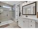 Well-lit bathroom with a glass-enclosed shower, a sleek vanity and tile flooring at 105 Bluff Isle Ct, Summerville, SC 29486
