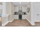 Charming butler's pantry with custom cabinetry, a wine cooler, and decorative accents at 105 Bluff Isle Ct, Summerville, SC 29486
