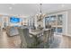 Open dining area offers seamless access to the living area and outdoor patio through sliding glass doors at 105 Bluff Isle Ct, Summerville, SC 29486