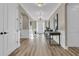 Light-filled foyer featuring wood flooring, crown molding, and stylish decor at 105 Bluff Isle Ct, Summerville, SC 29486