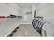 Organized walk-in closet with ample shelving, hanging space and stylish flooring at 105 Bluff Isle Ct, Summerville, SC 29486