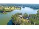 Aerial view of serene community lakeside pavilion surrounded by lush green trees at 107 Nutmeg Way, Summerville, SC 29485