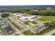 Aerial view of the school with ample parking, athletic fields, and easy access to nearby neighborhood at 107 Nutmeg Way, Summerville, SC 29485