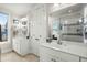 Bright bathroom with double vanity, lots of light, and tiled shower at 107 Nutmeg Way, Summerville, SC 29485