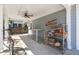 Covered garage storage space with work area and ceiling fan; perfect for projects and keeping organized at 107 Nutmeg Way, Summerville, SC 29485
