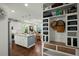 Bright, open kitchen with a center island, stainless steel appliances, and a storage area at 107 Nutmeg Way, Summerville, SC 29485