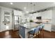 Bright eat-in kitchen features stainless steel appliances, white cabinets, granite countertops, and an island at 107 Nutmeg Way, Summerville, SC 29485