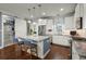 Modern kitchen with stainless steel appliances, granite countertops, kitchen island, and stylish pendant lighting at 107 Nutmeg Way, Summerville, SC 29485