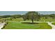 A picturesque golf course view with lush greens, mature trees, and manicured fairways at 1153 Summerwind Ln, Seabrook Island, SC 29455