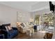 Enjoy the comforts of this beautifully furnished living room with access to the screened in patio at 1153 Summerwind Ln, Seabrook Island, SC 29455