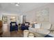 Spacious living room with screened in patio with comfortable seating and dining at 1153 Summerwind Ln, Seabrook Island, SC 29455