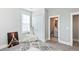 Bedroom featuring neutral walls, a walk-in closet and a door to an attached bathroom at 123 Hewitt St, Summerville, SC 29486