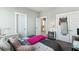 Bedroom features neutral walls, light carpet, a full-sized bed with patterned pillows, and two closets with mirrors at 123 Hewitt St, Summerville, SC 29486