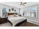 Bright bedroom with a large bed, nightstands, and plenty of natural light streaming through the windows at 123 Hewitt St, Summerville, SC 29486