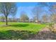 Scenic view of community green space with trees and landscaping at 123 Hewitt St, Summerville, SC 29486
