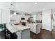 Bright kitchen with white cabinets, marble countertops, and stainless steel appliances at 123 Hewitt St, Summerville, SC 29486