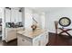 Stylish kitchen island with marble countertop and white cabinetry, perfect for meal prep at 123 Hewitt St, Summerville, SC 29486