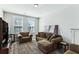 Cozy bonus room with plush seating, large rug, and ample lighting at 123 Hewitt St, Summerville, SC 29486