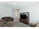 Inviting living room with comfortable seating, media center, and neutral décor at 123 Hewitt St, Summerville, SC 29486