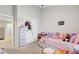 Bedroom with ceiling fan, wall decor, closet, and organizers at 124 Gaura Ln, Summerville, SC 29483