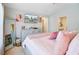 Bedroom with ceiling fan, artwork and decor, and full length mirror at 124 Gaura Ln, Summerville, SC 29483