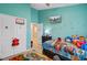 Bright bedroom with closet, dresser, light and TV, and 'Cars' themed decor at 124 Gaura Ln, Summerville, SC 29483