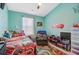 Charming bedroom with a 'Cars' theme, bright colors, and natural light from the window at 124 Gaura Ln, Summerville, SC 29483