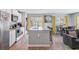 Modern kitchen with island, stainless steel appliances, and open access to living spaces at 124 Gaura Ln, Summerville, SC 29483