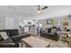 Inviting living room flowing into kitchen, featuring open concept and modern finishes at 124 Gaura Ln, Summerville, SC 29483