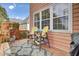 Back porch featuring an outdoor table and chairs with cushions for outdoor relaxing at 1428 Bloomingdale Ln, Mount Pleasant, SC 29466