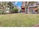 Large backyard featuring a well-maintained lawn, mature trees, and ample space for recreation at 1428 Bloomingdale Ln, Mount Pleasant, SC 29466