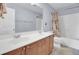 Bathroom features a double sink vanity, a separate toilet area, and a shower and tub combination at 1428 Bloomingdale Ln, Mount Pleasant, SC 29466