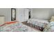Comfortable bedroom with two twin beds, floral bedding, and easy access to the ensuite bathroom at 1428 Bloomingdale Ln, Mount Pleasant, SC 29466