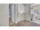 Carpeted hallway with laundry room and bathroom at 1428 Bloomingdale Ln, Mount Pleasant, SC 29466