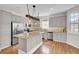 Well-equipped kitchen featuring stainless steel appliances, granite countertops, and custom cabinetry at 1428 Bloomingdale Ln, Mount Pleasant, SC 29466