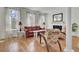 Cozy living room featuring hardwood floors, a fireplace, comfortable seating, and bright natural light at 1428 Bloomingdale Ln, Mount Pleasant, SC 29466