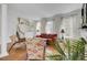 Inviting living room offering hardwood floors, a fireplace, comfortable seating, and ample natural light at 1428 Bloomingdale Ln, Mount Pleasant, SC 29466
