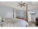 Main bedroom with four-poster bed and ensuite bathroom at 1428 Bloomingdale Ln, Mount Pleasant, SC 29466