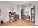 Bright office with wood floors, desk, bookcases, and window at 1428 Bloomingdale Ln, Mount Pleasant, SC 29466