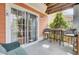 Outdoor patio area with comfortable seating and access to the home via sliding glass doors at 1428 Bloomingdale Ln, Mount Pleasant, SC 29466
