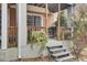 Covered patio area with steps, and an outdoor seating area with an outdoor table at 1428 Bloomingdale Ln, Mount Pleasant, SC 29466
