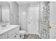 Bright bathroom features white vanity, patterned shower curtain, and stylish fixtures at 144 Back Tee Cir, Summerville, SC 29485