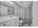Bathroom featuring a sink with cabinets and a shower with a curtain at 144 Back Tee Cir, Summerville, SC 29485