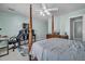 Bedroom with a four-poster bed, a ceiling fan, and a gray patterned rug at 144 Back Tee Cir, Summerville, SC 29485