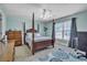 Stylish bedroom features a four-poster bed, light blue walls and a ceiling fan at 144 Back Tee Cir, Summerville, SC 29485