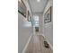Hallway with beautiful wood-look tile floors and arched entryway leading to the living room at 144 Back Tee Cir, Summerville, SC 29485