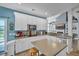 Spacious kitchen featuring white cabinets, stainless appliances, and eat-in kitchen area at 144 Back Tee Cir, Summerville, SC 29485